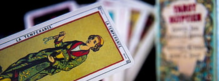 Tarot card understanding through a deck of shuffled symbolic cards article author Karen Rego